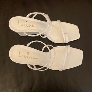 These are Lulus, wedge sandals, white, size 8.